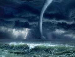 Lo spettacolare vortice d’acqua creatosi su una scogliera delle Isole Faroe - In a Bottle
